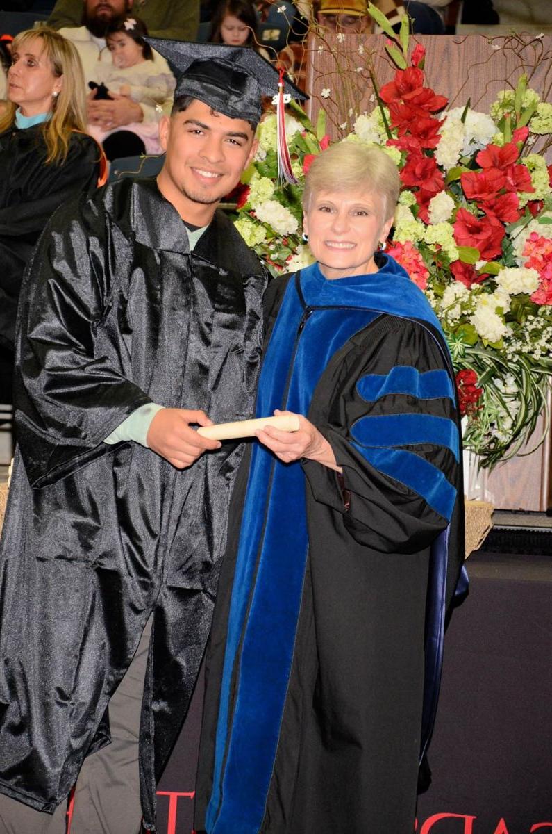 Dr. Kathy Murphy with a graduate at Gadsden State commencement